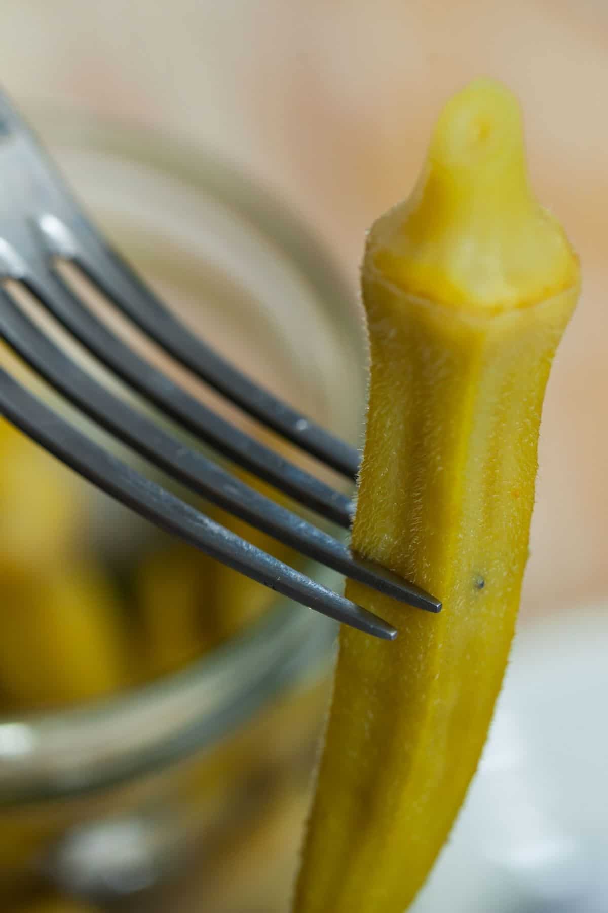 pickled okra on a fork pickled okra on a fork