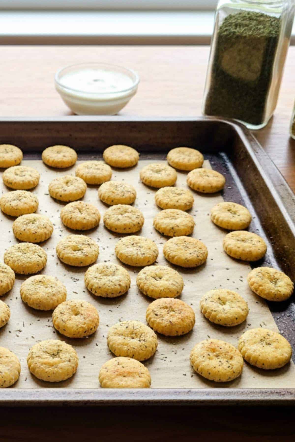 ranch oyster crackers on a baking tray