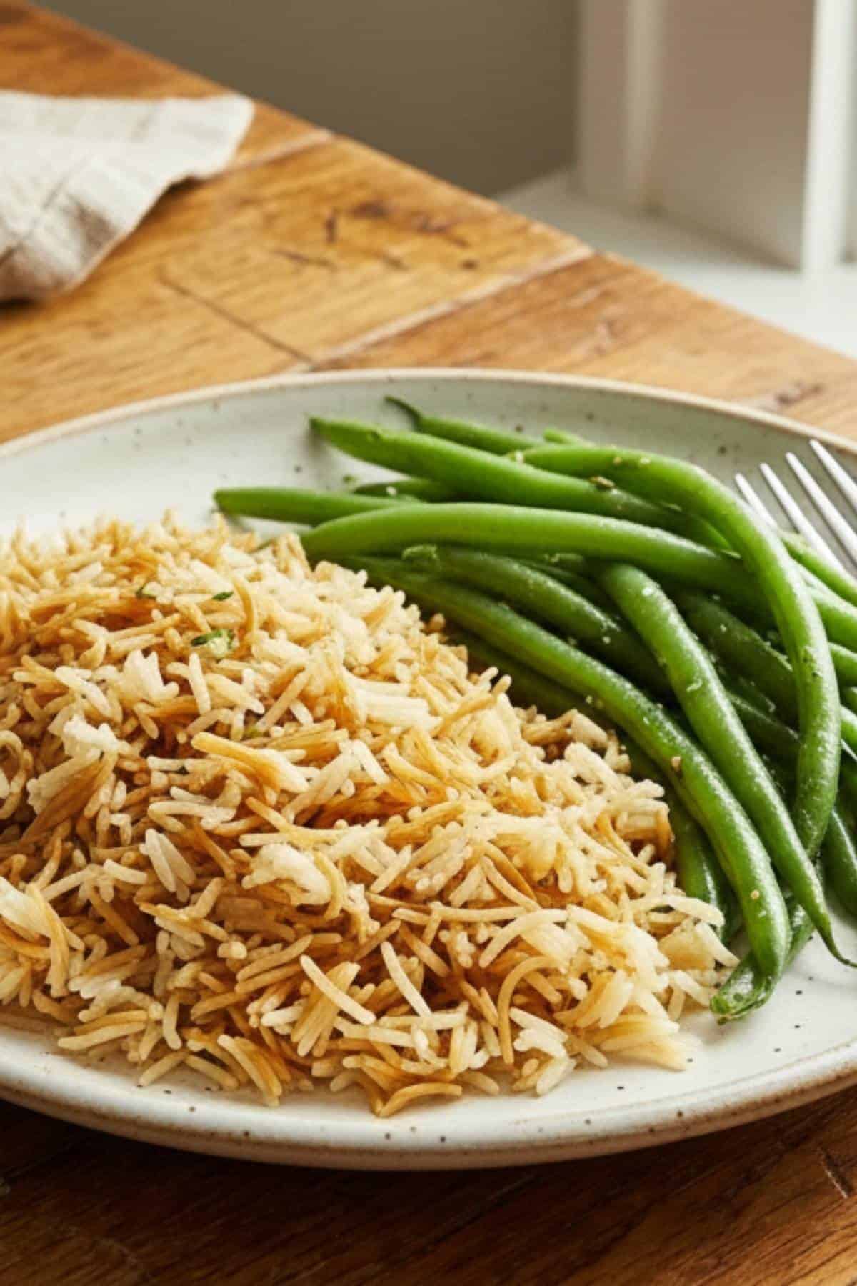 rice a roni chicken flavor on a plate with green beans rice a roni chicken flavor on a plate with green beans