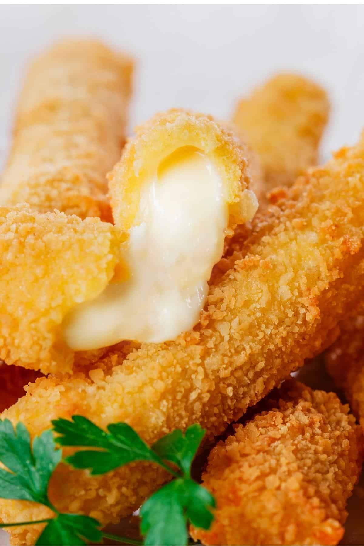 smoked cheese sticks on a plate smoked cheese sticks on a plate